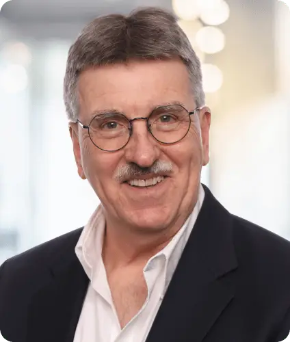 Professional headshot of Mark Deniston.