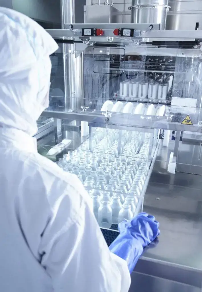 Worker troubleshooting Peroxide Concentration Issues in Aseptic Equipment.