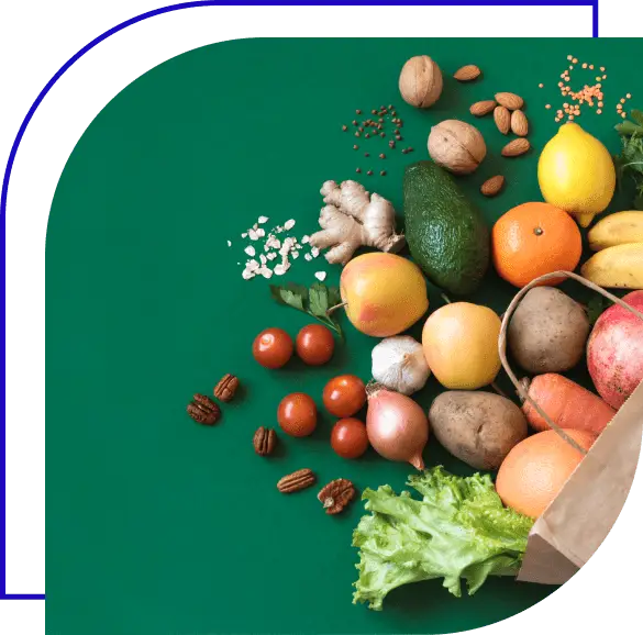 Paper bag holding fruits, veggies, and nuts.