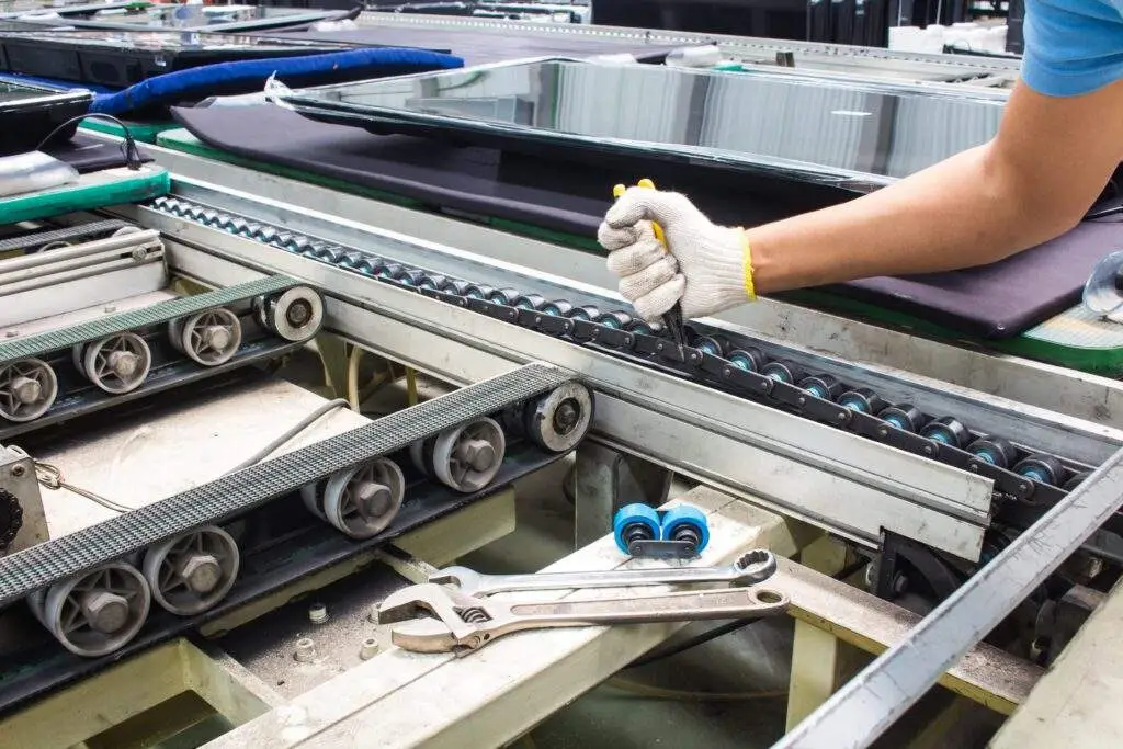 working fixing belt on food production facility.