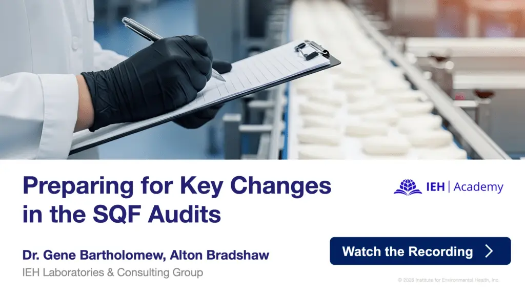 A promotional graphic for an IEH Academy webinar titled "Preparing for Key Changes in the SQF Audits," featuring speakers Dr. Gene Bartholomew and Alton Bradshaw from IEH Laboratories & Consulting Group. The top half shows a person wearing a lab coat and black gloves writing on a clipboard in front of a factory conveyor belt. A blue button on the bottom right reads "Watch the Recording" with a right-facing arrow.